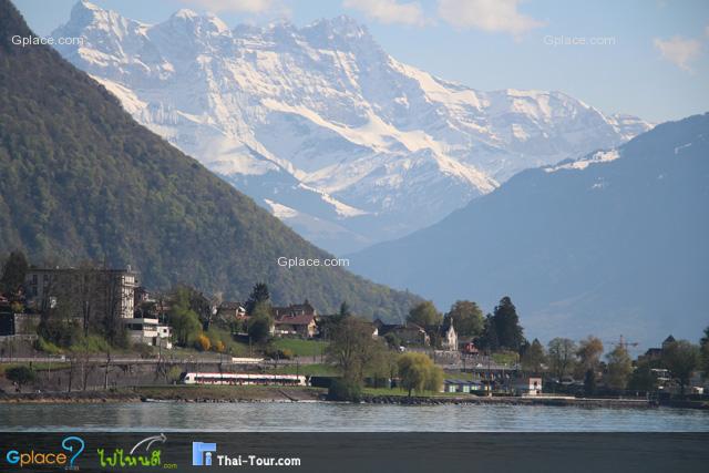 Good background from the pier:
the Alps and high-speed train along Lake Geneva