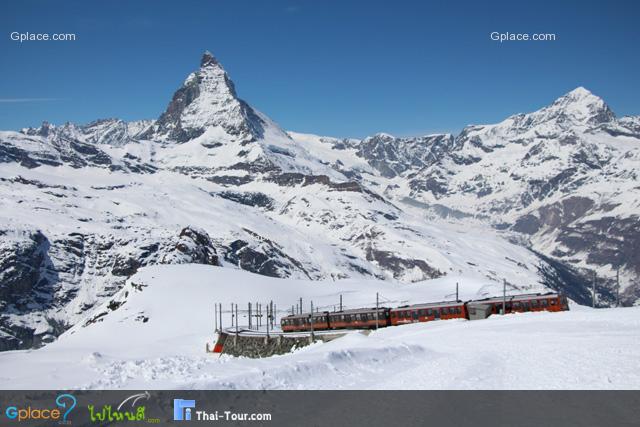 just wait to take this shot, a train on the snow railway with Matterhorn background